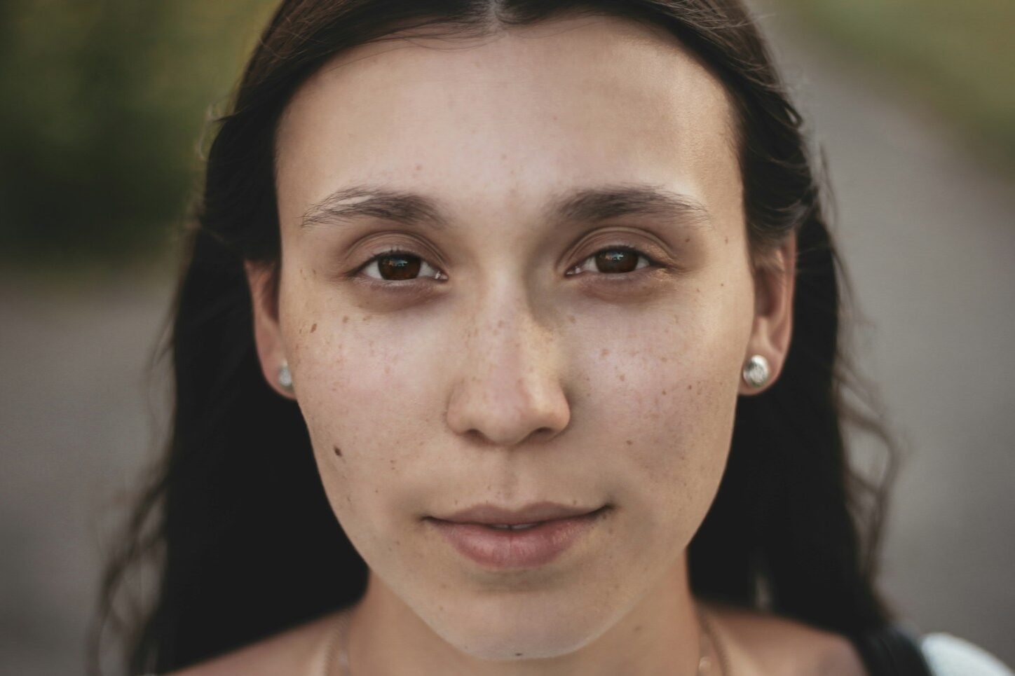 selective focus photography of woman wearing white shirt
