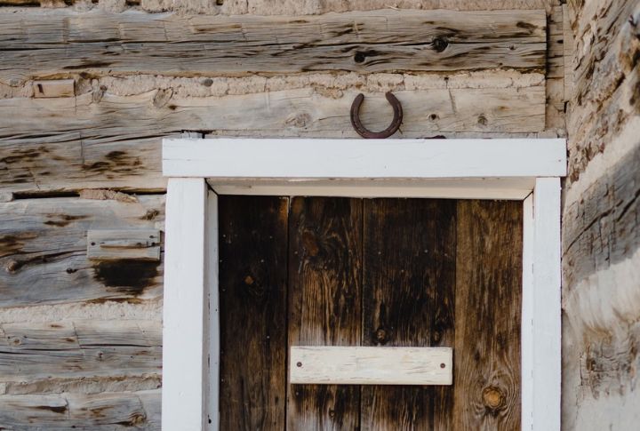 Hanging A Horseshoe Over The Bunkhouse Door