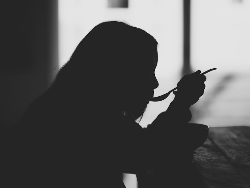 woman eating at table