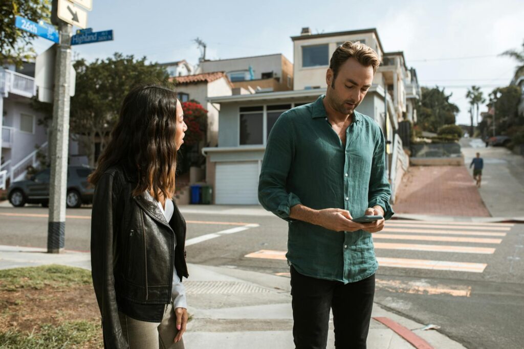 Couple having a heated discussion outdoors, reflecting on relationship conflicts.