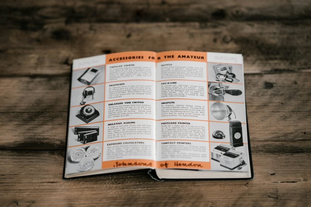 opened book laid in brown table