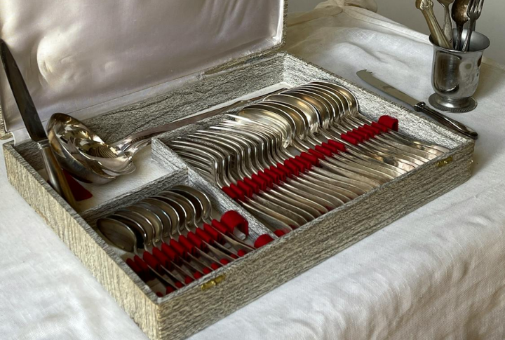 A Silverware Set With Serving Utensils