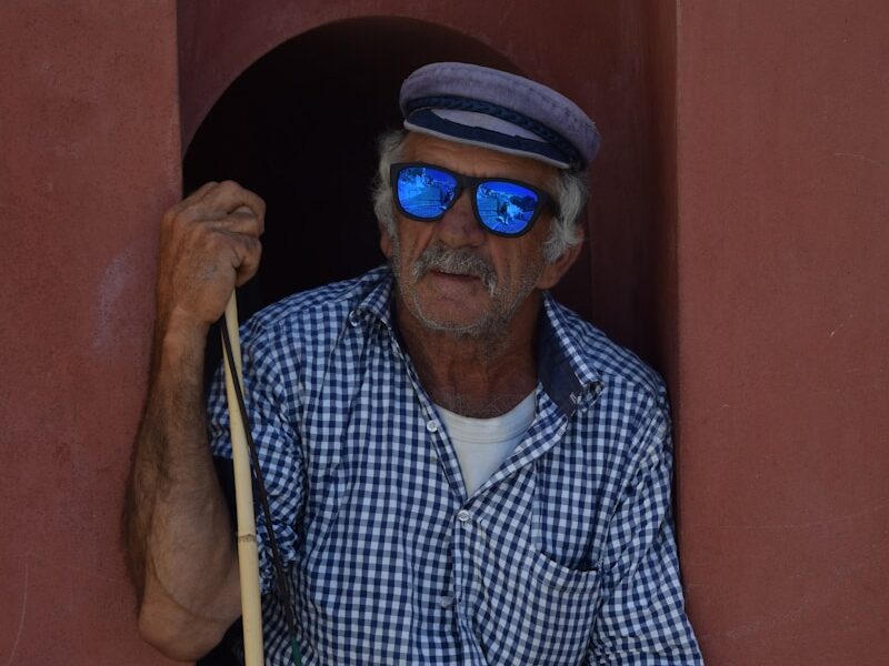 man with sunglasses sitting