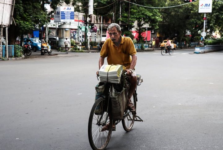 Newspaper Delivery Person